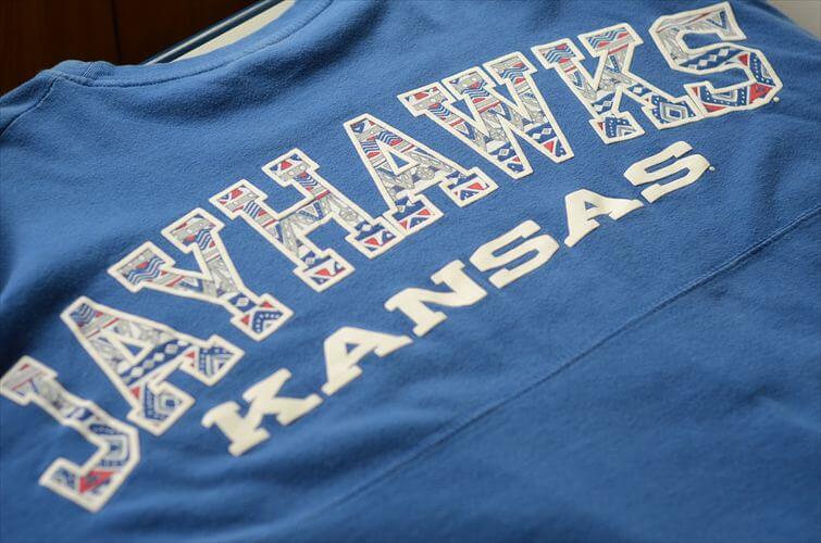 USA古着 KANSAS Univ JAYHAWKS カレッジ ロンT メンズM 長袖Tシャツ ブルー 大学 アメリカ古着